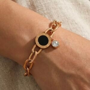 18K Rose Gold-Plated bracelet featuring round charm with black inlay and Roman numerals, and a dangling zircon stone