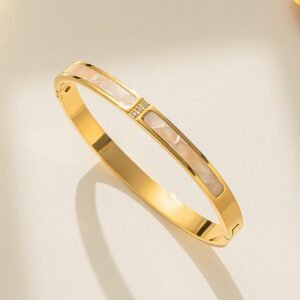 18K Gold-Plated bangle featuring mother of pearl inlay and cubic zircon stones.