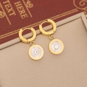 18K gold-plated hoop earrings with a circular pendant and a central sparkling stone