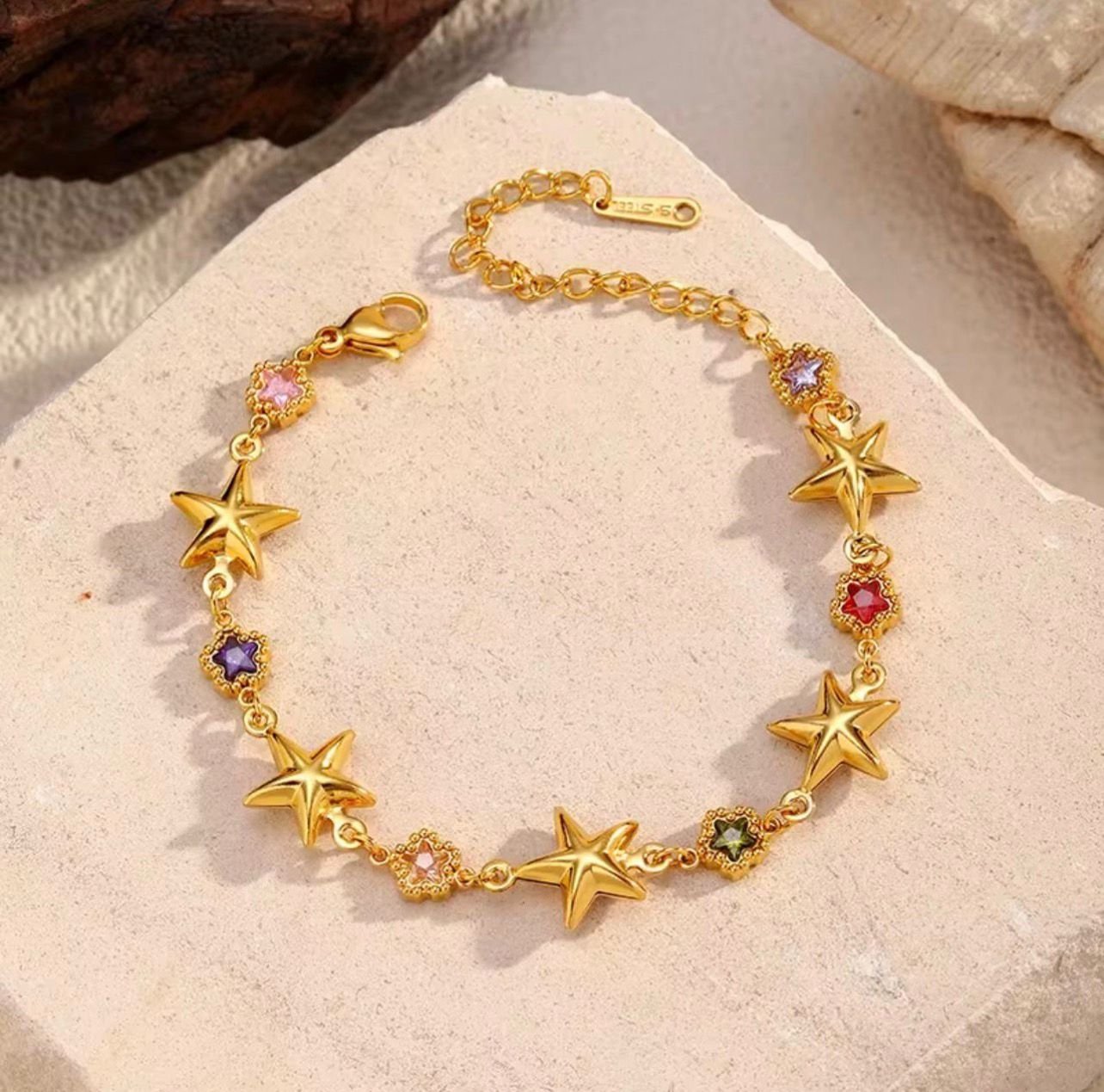 18K Gold-Plated bracelet featuring polished stars pendants and colorful vibrant cubic zircon