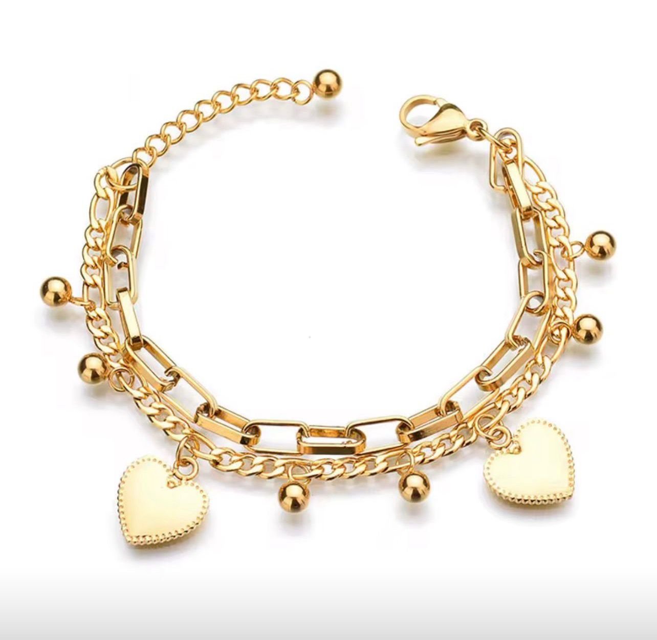 18K gold-plated charm bracelet featuring multi-chain layers, ball charms, and heart charms
