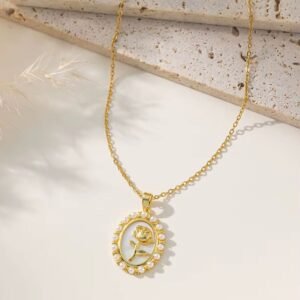 18K Gold-Plated necklace with a rose design enclosed in an oval border decorated with small pearls