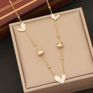 18K Gold-Plated link chain featuring dainty mother-of-pearl heart charms and sparkling baguette-cut Zircon stations