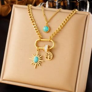 18K Gold-Plated double layer necklace featuring turquoise accents, a radiant sunburst charm, a Zircon-studded hoop, and a tree-of-life pendant