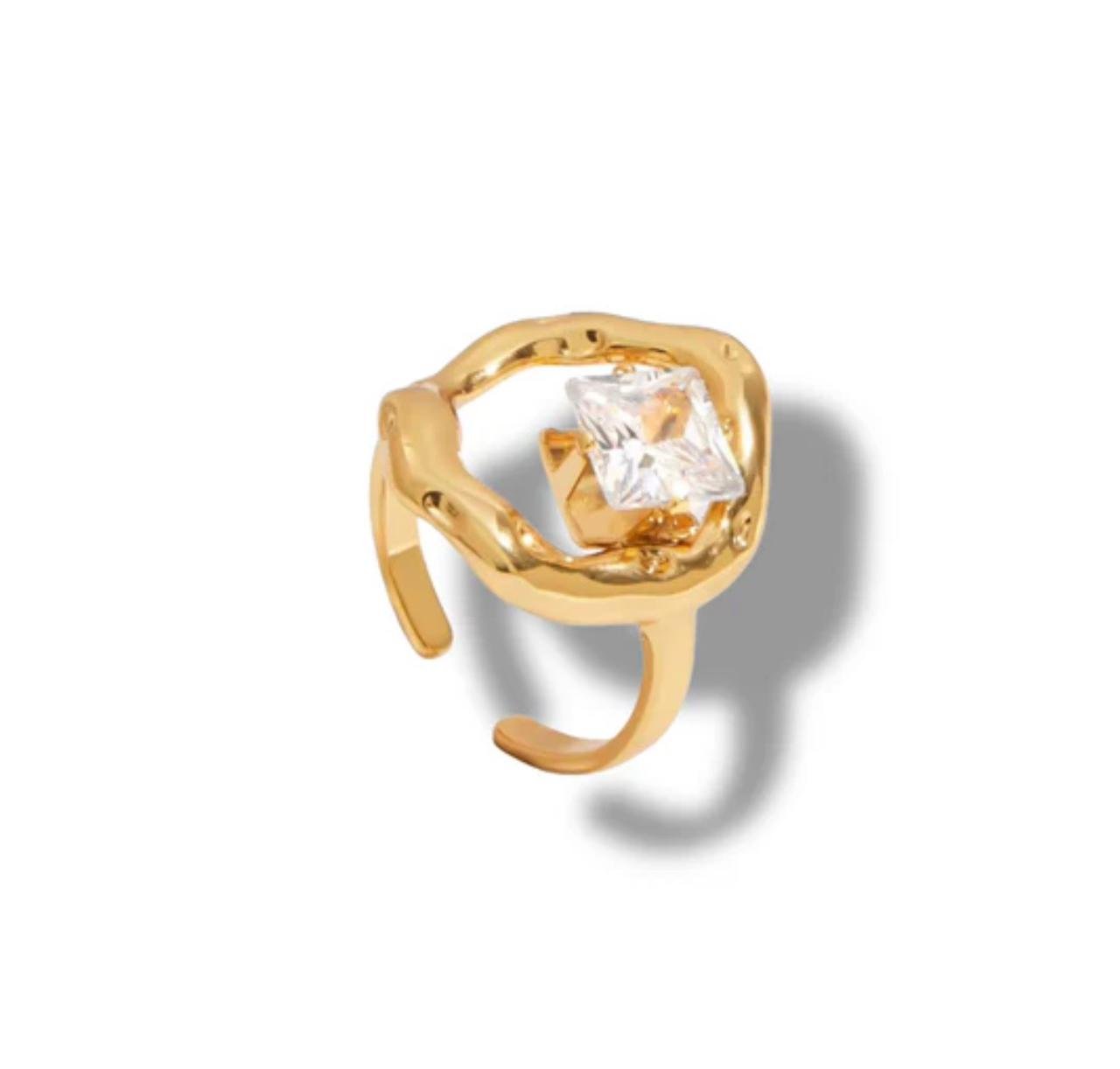 18K Gold-Plated statement piece featuring a radiant square-cut cubic zirconia suspended in a sculptural frame