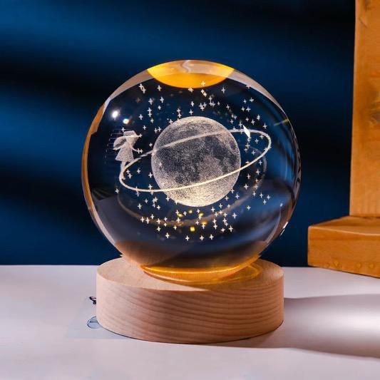 3D Crystal Ball Night Light featuring a girl dancing around the Earth