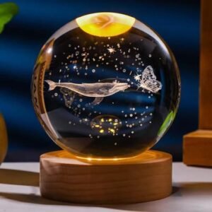 3D engraved crystal ball night light featuring a whale and butterfly design